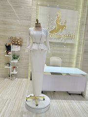 A comfortable and stylish knee-length dress with sleeves, perfect for a family gathering